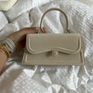 Beige Zara clutch with strap